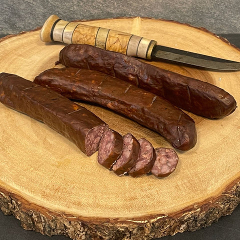 Hot smoked reindeer sausage with nettle
