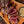 Load image into Gallery viewer, Renkalvinnanlår tillagat som renstek uppskivat perfekt rare på träskiva med peppar
